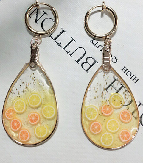レモンとオレンジのイヤリングの画像(プリ画像)
