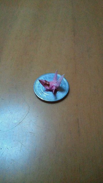 1円に乗った鶴の画像(プリ画像)